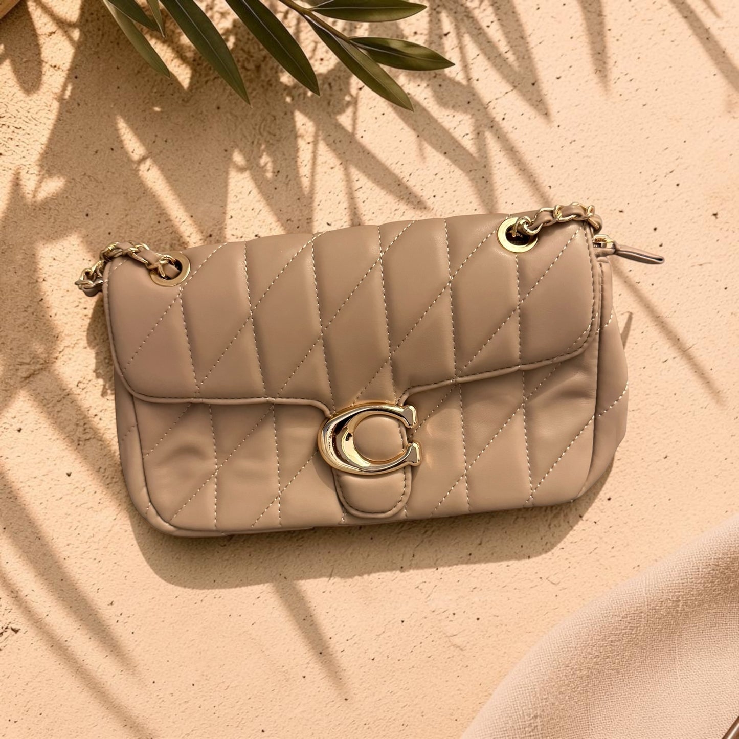Signature Lock Quilted Chain Bag | HerEdits
